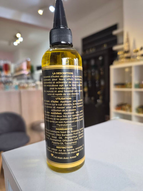 HKS' Secret — Composition détaillée ricin moringa olive romarin, étiquette dos du flacon